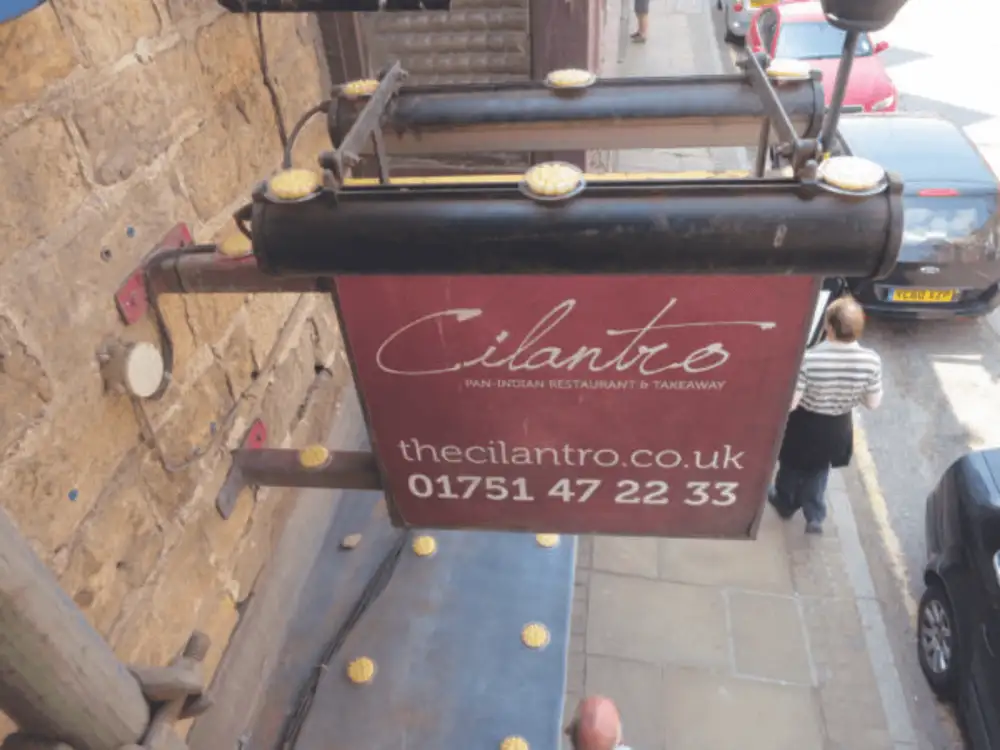 Optical Gel dishes installed out of sight on signage