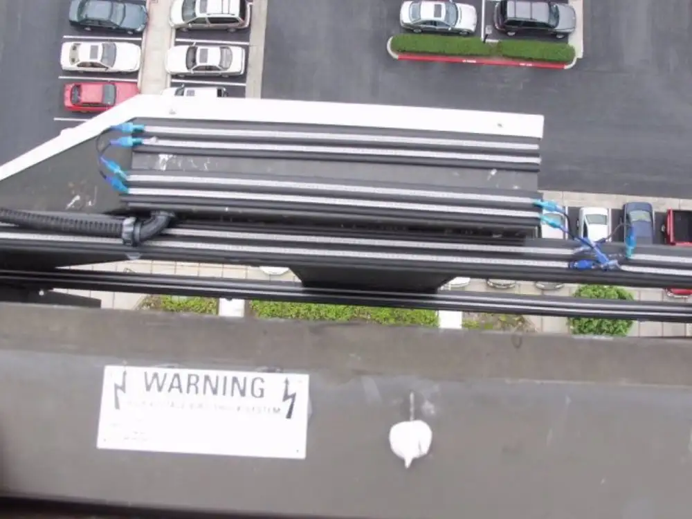 Bird-Shock track protecting commercial signage