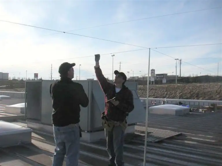 Gridwire suspended above rooftop HVAC equipment
